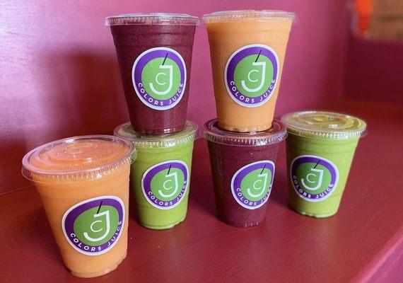 Organic juices  green , purple and coral