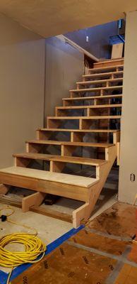 Replaced a spiral staircase with an oversized standard style staircase.