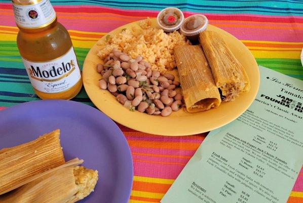 Variety of tamales. Yellow is the lunch combo with rice and beans.