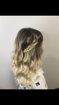 Balayage and babylights styled with soft waves and a four strand braid.