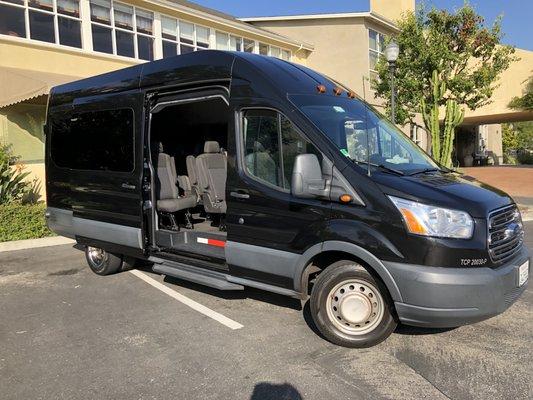 14 Passenger high top Ford transit van