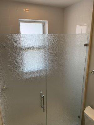 Frameless Shower enclosure using 3/8" rain pattern tempered glass