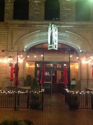 Accent lighting on the Fork restaurant sign.