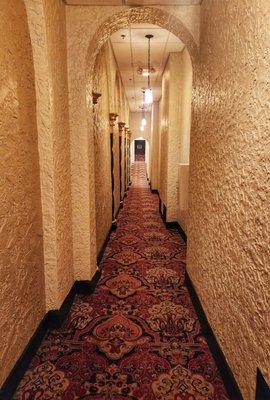 Long hallway to their backstage theater