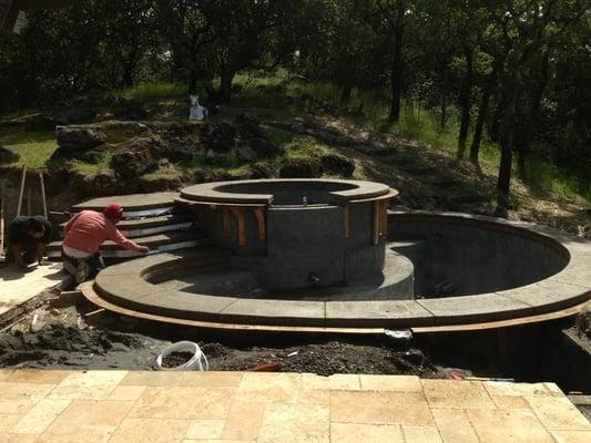 The boss working on the pool deck..