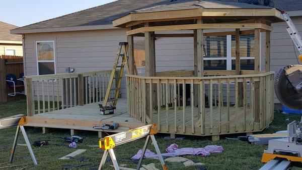 This gazebo is attached to a deck.