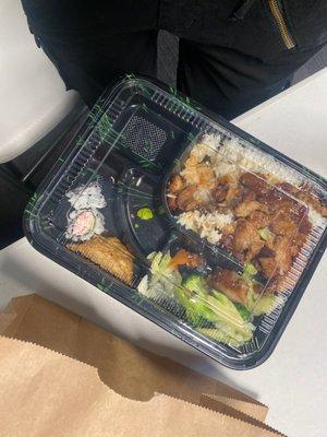 Dumplings, California roll, small ass pea sized wasabi chicken and rice lettuce