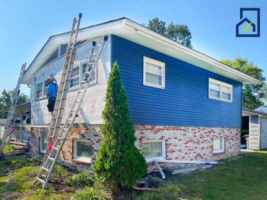 Installing new vinyl siding