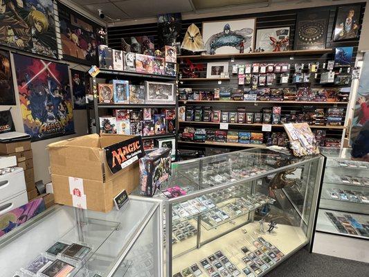 Magic: The Gathering section. Not pictured on the right where I took the photo are more card sleeves, deck boxes and playmat tubes.