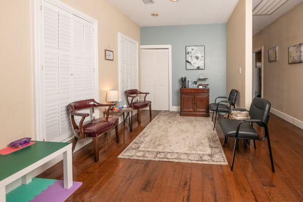 Parents have a comfortable lobby area to wait for their child.