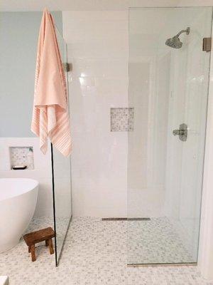 Walk in shower with heated floor throughout the bathroom.