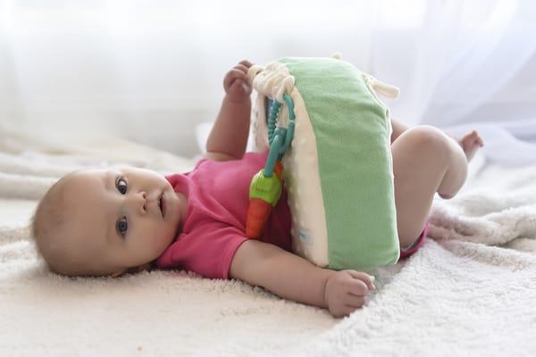 Shop www.Snuggwugg.com Baby & toddler pillow for diaper changes travel tummy time and more. Makes a unique baby shower gift