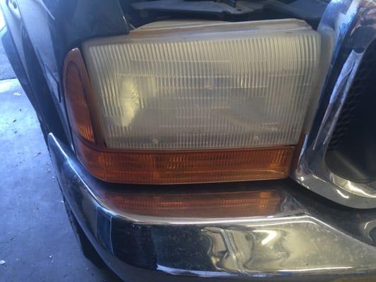 This is a Close up of one of the headlights before Crackmaster applied their process. This is actually unsafe to drive with at night.