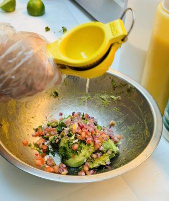 Making fresh guacamole to order