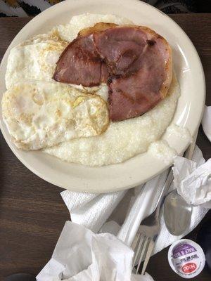 Eggs over soft country ham and grits