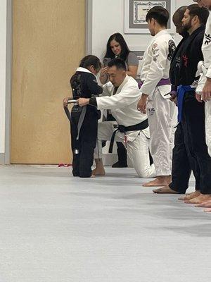 Her grey and white belt promotion