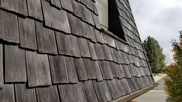 CeDUR Shiloh mansard roof located in Golden, Colorado. This mansard siding roof was damaged in a hail storm and replaced with CeDUR Shakes.