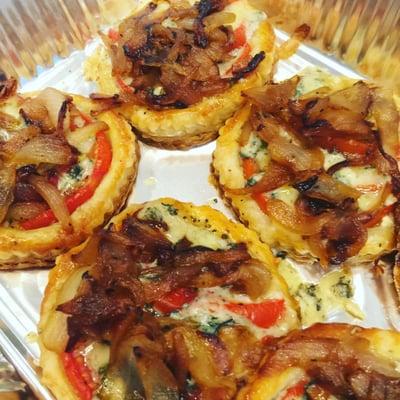 Tomato, caramelized onion and English Stilton blue cheese tarts.