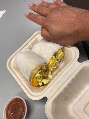 Too put in perspective how tiny this $10 burrito was. And i have normal sized hands at best. Smh