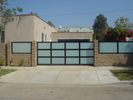 Block wall fence higher than standard was installed. Special permit called variance was obtained by the city to perform by code.