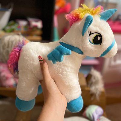 Side view of my daughter's unicorn souvenir we got her! She loves it!