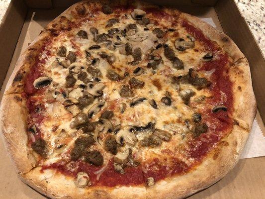 Sausage onion and mushroom pizza.