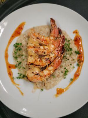 Grilled Prawns served over coconut risotto