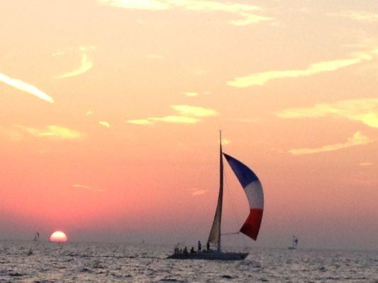 sailboat at sunset.