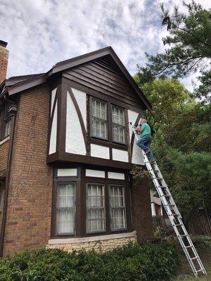 Exterior trim and wood repaint. Stucco white and trim brown