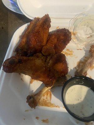 These are definitely some dry wings. My drum isn't even saused and it's cooked way too hard