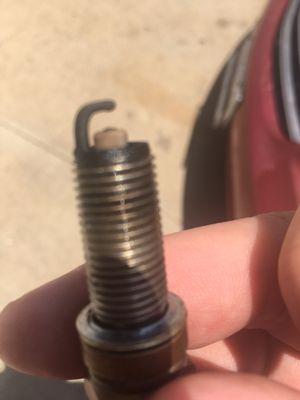 Cylinder 4 spark plug when it was taken out. And the base was so loose. Switching to NGK