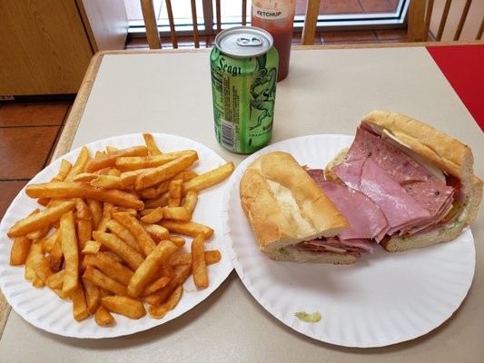 The $10 lunch special included a canned soda, plate of fries, and an 8" sub