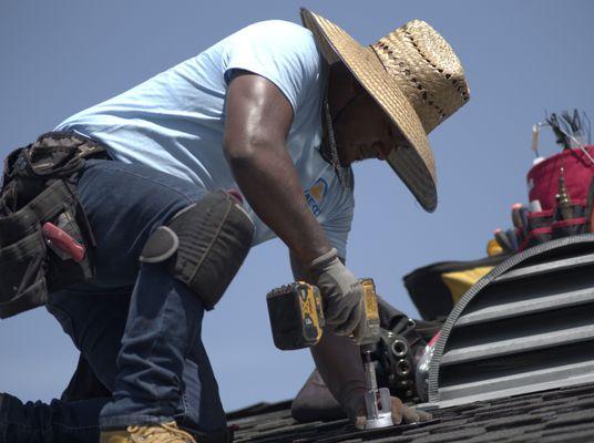 Witness the diligent team in action as they work tirelessly through the solar transformation process.