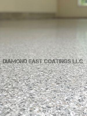 This is a close up of an epoxy flake floor system