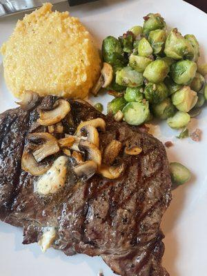 Ribeye with bacon Brussel sprouts and cheese grits.