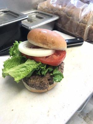 Standard hamburger all the way. Veggies are always fresh and stacked up high.