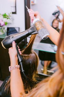 Enjoy a blowout with each service we provide . giving you lots of volume, shine and smoothness