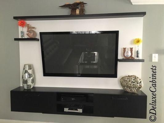 Modern black and white entertainment center.