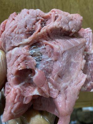 Meat with a glue like substance holding it together