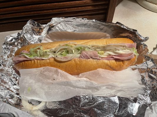 Italian sub (no tomatoes). Stuffed nicely with meat, fresh lettuce and onions on a delicious roll. Really enjoyed it!!