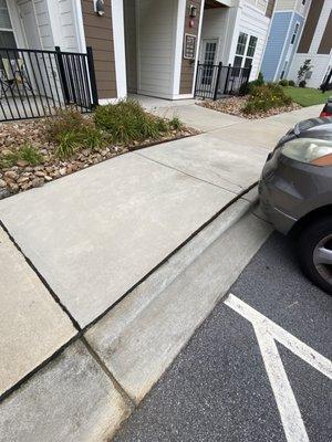 Safety hazard: sidewalk at handicap parking spot in front of 2175 is raised and keeps getting worse.