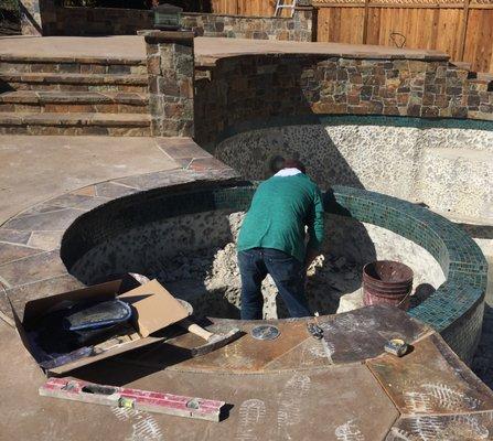 Cali. Gunite installing Glass tile around the pool and Jacuzzi.  Morgan Hill CA. Andy's house.