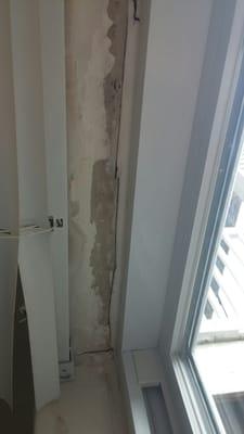 Around window in second bedroom. Maintenance man caulked around window but water continued to pour in. More complaints.