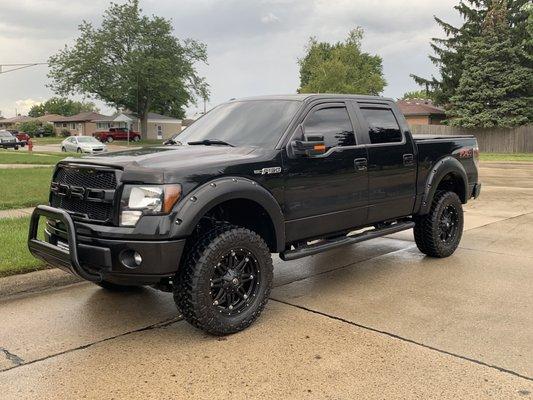 My truck after OCD did there thing..  wish it wasn't raining but oh well still looks bad ass..