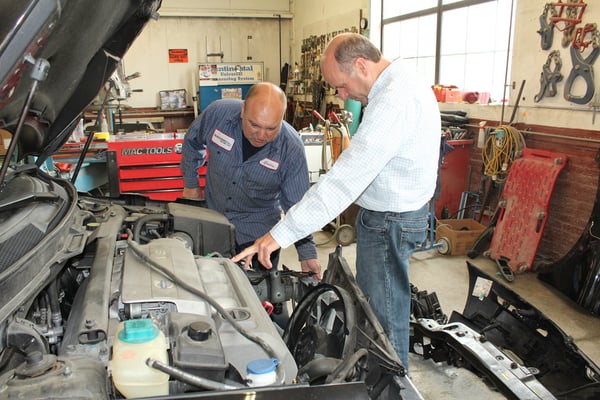 Paul Bastien is the general manage( pictured on right)
''All of our work is guaranteed for as long you own your car"