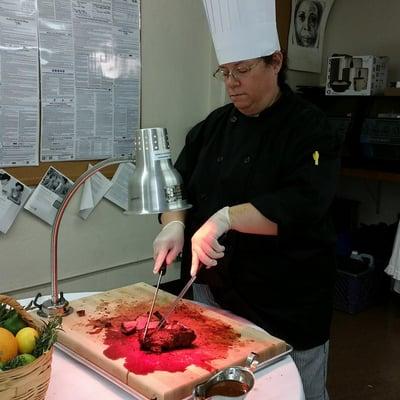 Carving our Pomegranate Lime Marinated Grilled Trip.