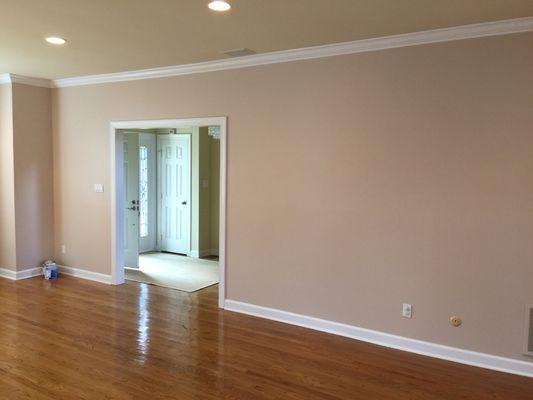 After picture of living room walls being painted