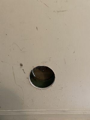 Cut a hole in the wall for the air conditioner