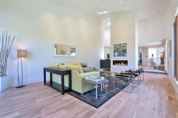 Looking in on the family room with soaring ceilings and a complex roof line.