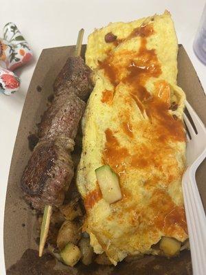 Kabomelette, steak kabob and omelette.